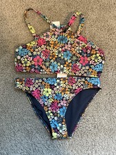 Brand new with tag Roxy two-piece swimsuit. Size 12 years.