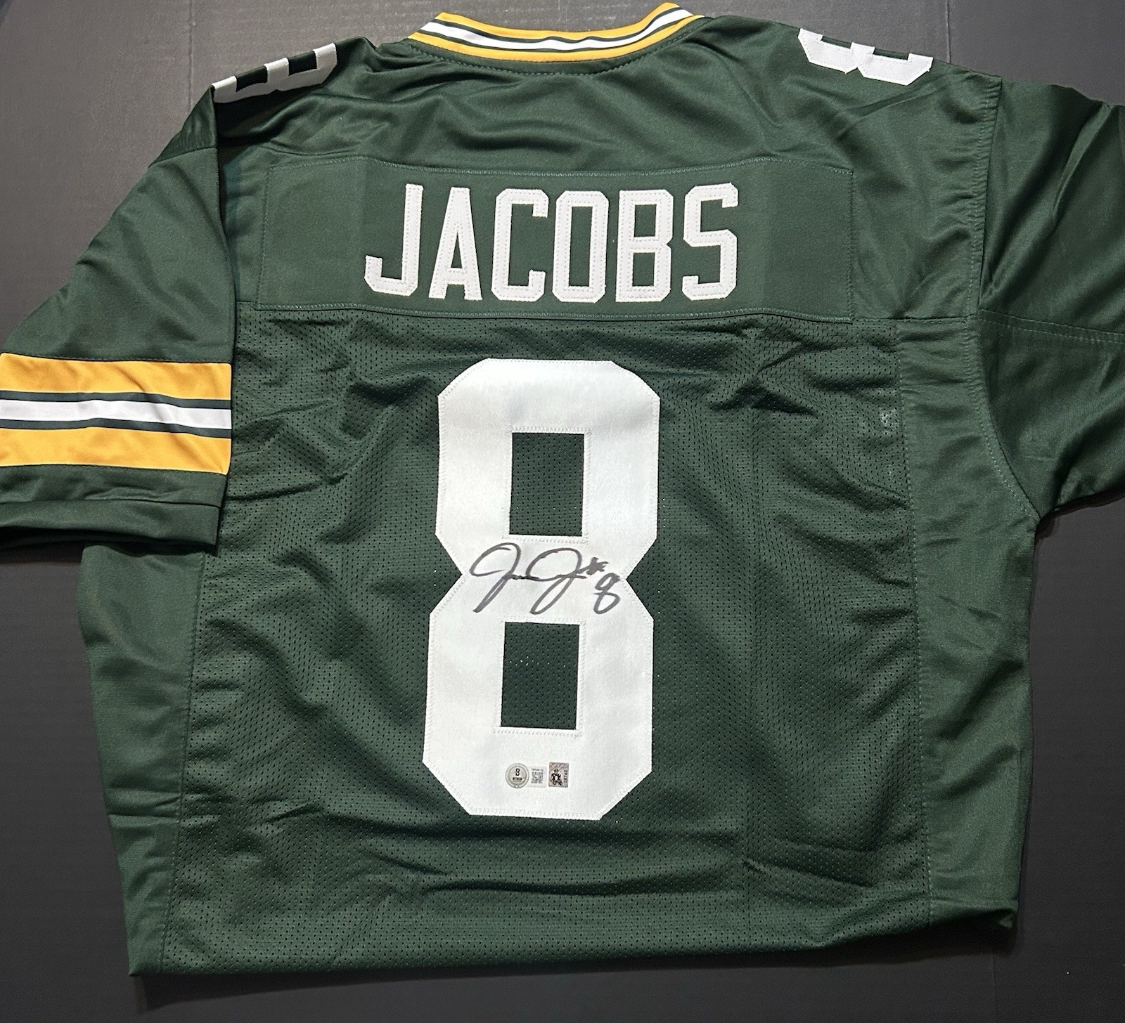 Autographed/Signed Josh Jacobs Green Bay Green Football Jersey Beckett Witnessed