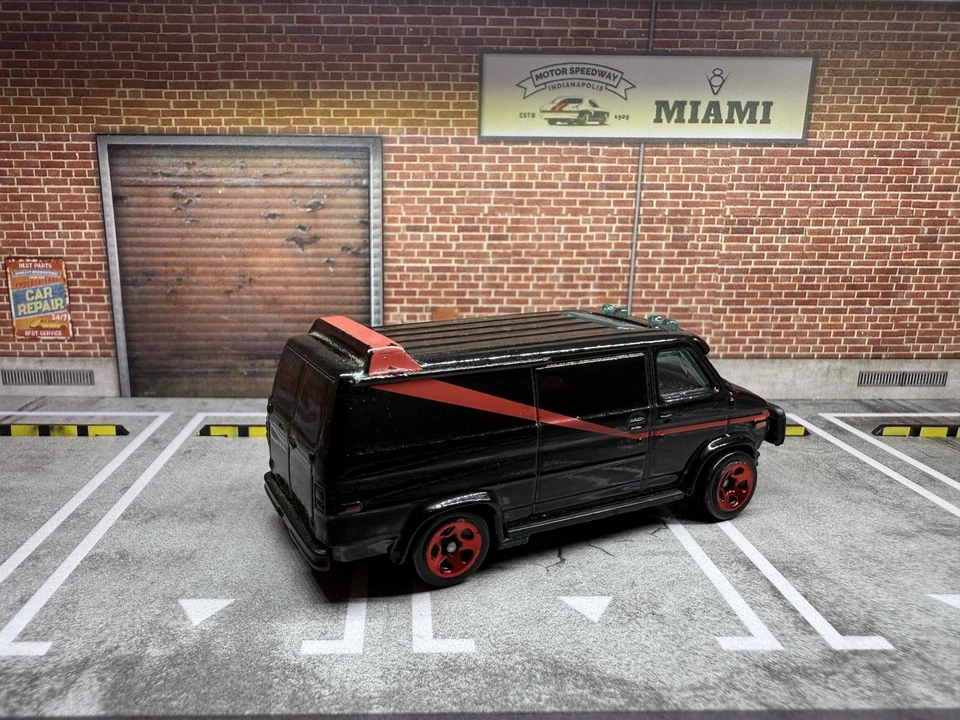 Hot Wheels 1983 GMC Vandura A-Team Van Black w/ Red Stripe 1:64 Diecast - Image 2 of 4