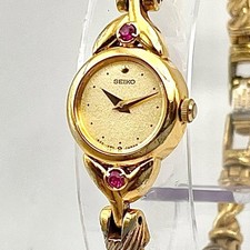 Seiko 1E20-0430 Rubin 2P Gold Armband Damen Quarzuhr 1996