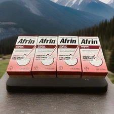 4 Pack Afrin 2 mg Spray Decongestant Treatment - 0.5 fl oz . Expires 03/2027