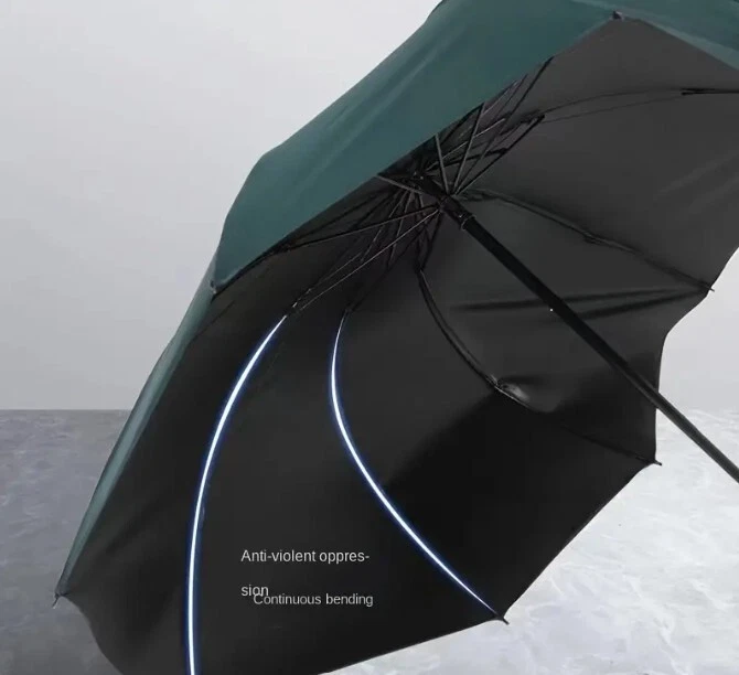 Paraguas plegable impermeable extra grande de 12 costillas a prueba de viento para mujer de negocios Foto 4 de 4