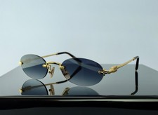 Miu Miu Logo SMU A54S ZVN8O Gold / Blue Lens Round Sunglasses 100 UV