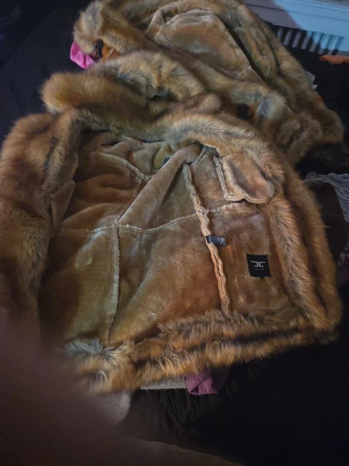 Abrigo negro de cuero de ley para mujer Foto 2 de 4