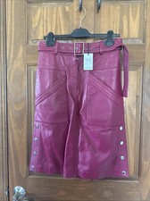 Falda midi Coach Lambs de cuero con tachuelas y cinturón rosa fushia para mujer talla 6
