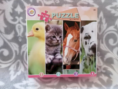 Puzzle 4x 100tlg. Tierwelt je 38x28cm ab 3 Jahre