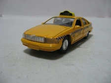 Welly #9052 Yellow Chevrolet Caprice Taxi Cab 4-3/4" Long Diecast Pullback Car