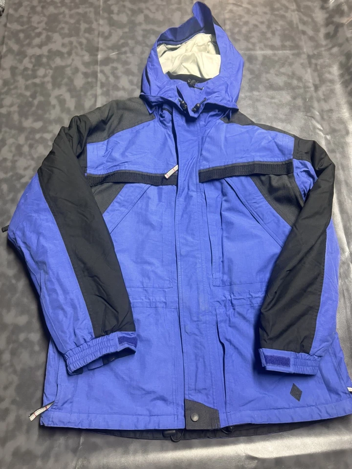 Chaqueta esquí diamante negro para hombre grande azul con detalles negros. Foto 4 de 4