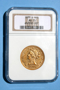 An 1877 s $10 Liberty Eagle Gold Coin, Certified NGC AU 55.