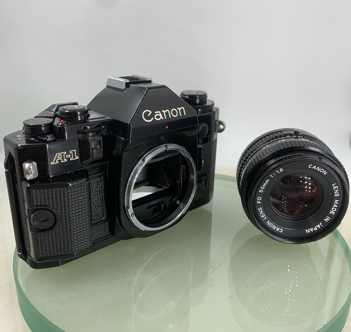 Canon A-1 35mm SLR Film Camera + FD 50mm f/1.8 Prime Lens Canon A-1 35mm SLR Film Camera + FD 50mm f/1.8 Prime Lens