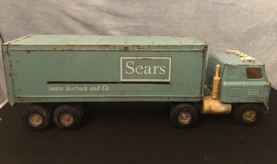 blue toy truck and trailer