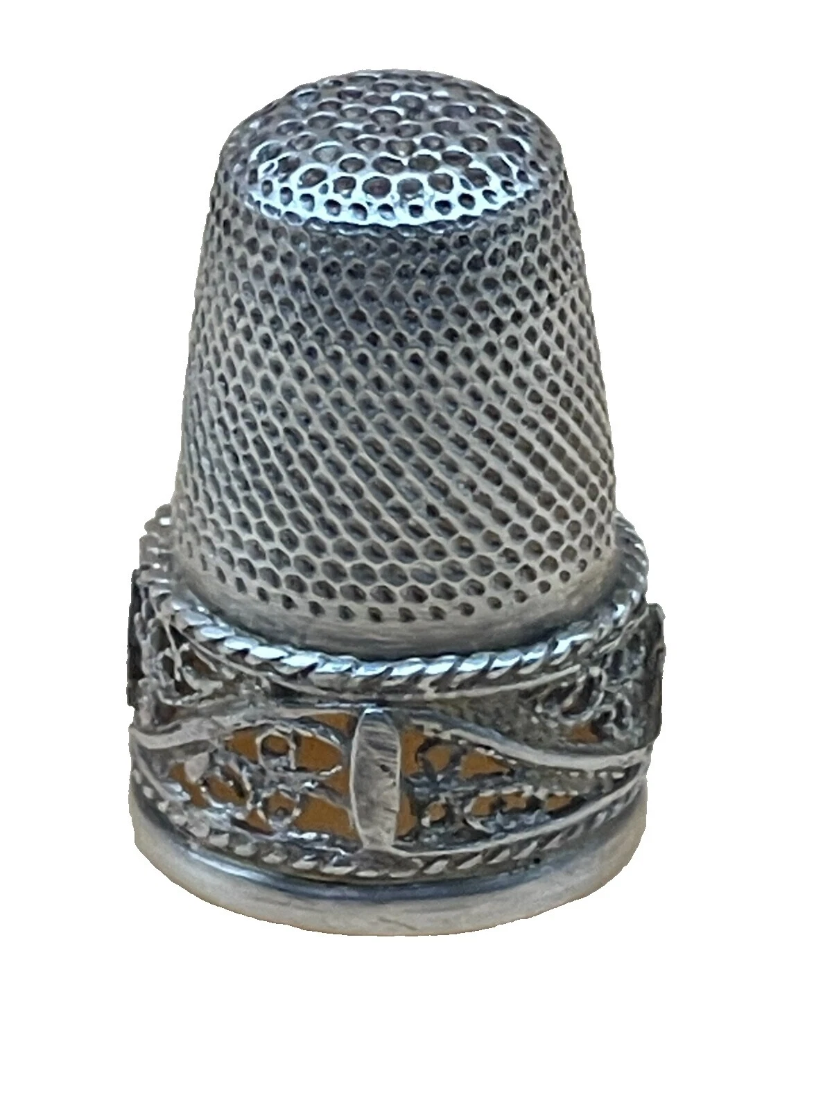 Dedales de mano de plata