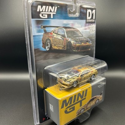 Mini GT Nissan SILVIA (S15) Top Secret D1 GRAND PRIX Gold #714 for