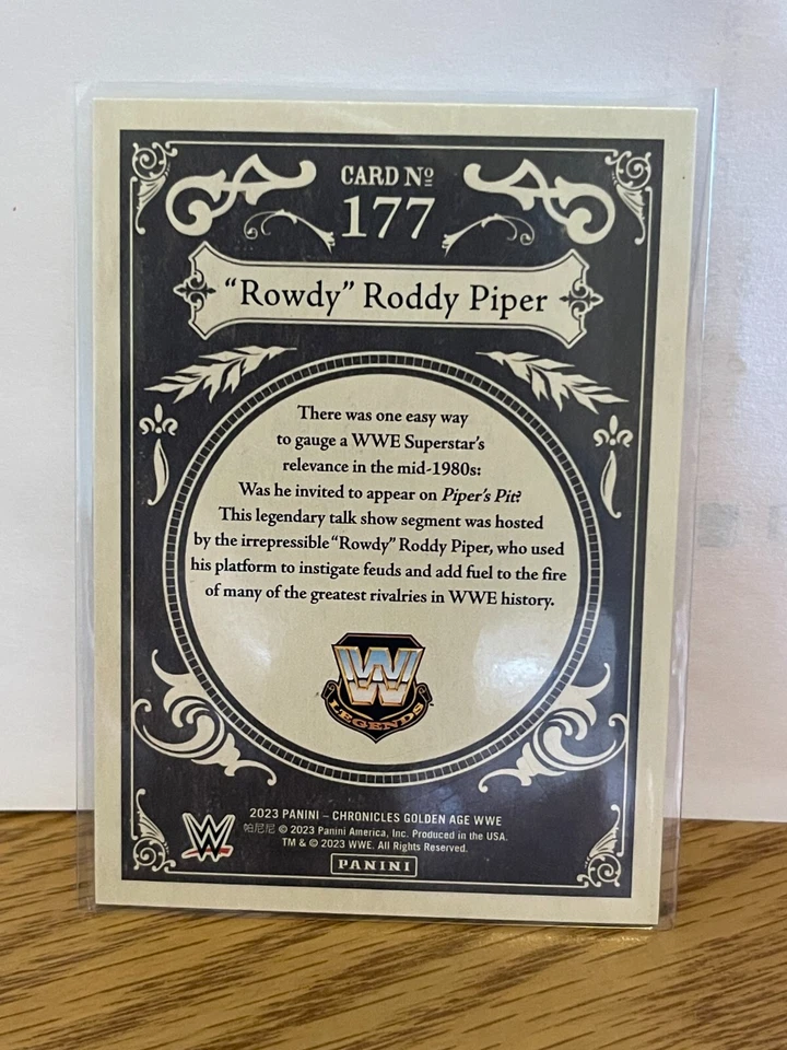 “Rowdy” Roddy Piper 2023 Panini Chronicles Golden Age WWE No. 177 - Image 2 of 2