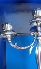 Raffinata coppia di candelabri in argento 800