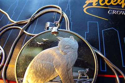 1990 New York Alley Cat Crown Pendant on a 20" Long 925 Silver Snake Chain.