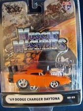 "MUSCLE MACHINES" 1/64 SCALE "69 DODGE CHARGER DAYTONA" ORANGE- SEALED