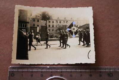 Great old photo - group of soldiers marching in front of barracks? place ???
