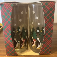 set of vintage Libbey/Crisa Christmas Tree and Penguin drinking glasses. 