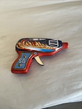 Vintage Tin Friction Space Gun Toy sparkler S.G. Made in Japan. Works
