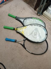 Three Tennis Rackets