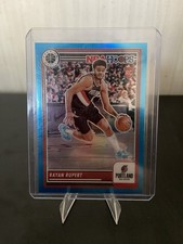 2023-2024 Panini Premium Stock Rayan Rupert /15 Neon Blue RC