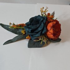 Formal Boutonniere with Dark Green and Orange Flowers