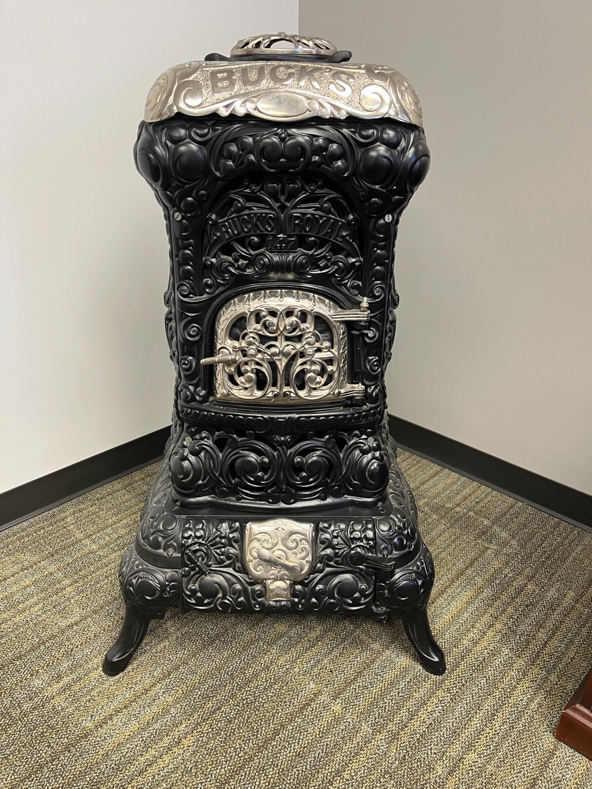 Antique Bucks Stove in flat black w chrome accessory pieces used for