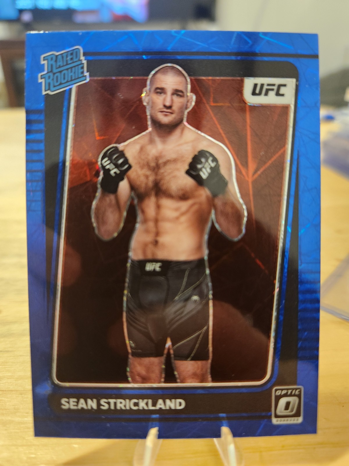 2022 Donruss Optic UFC Blue Velocity #111 Sean Strickland Rated Rookie Mint