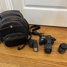 Pentax K10 10.2MP Digital SLR Camera w/ 2 Lenses, Flash, And Camera Bag read 