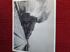 Vintage Picture Steam Locomotive On Travelling Snowy Tracks