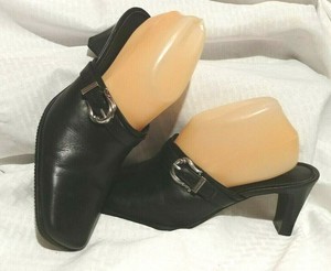 white leather vans with black stripe