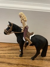 Schleich horse and rider set, includes horse, tack, and rider