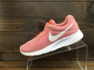 peach color nike shoes