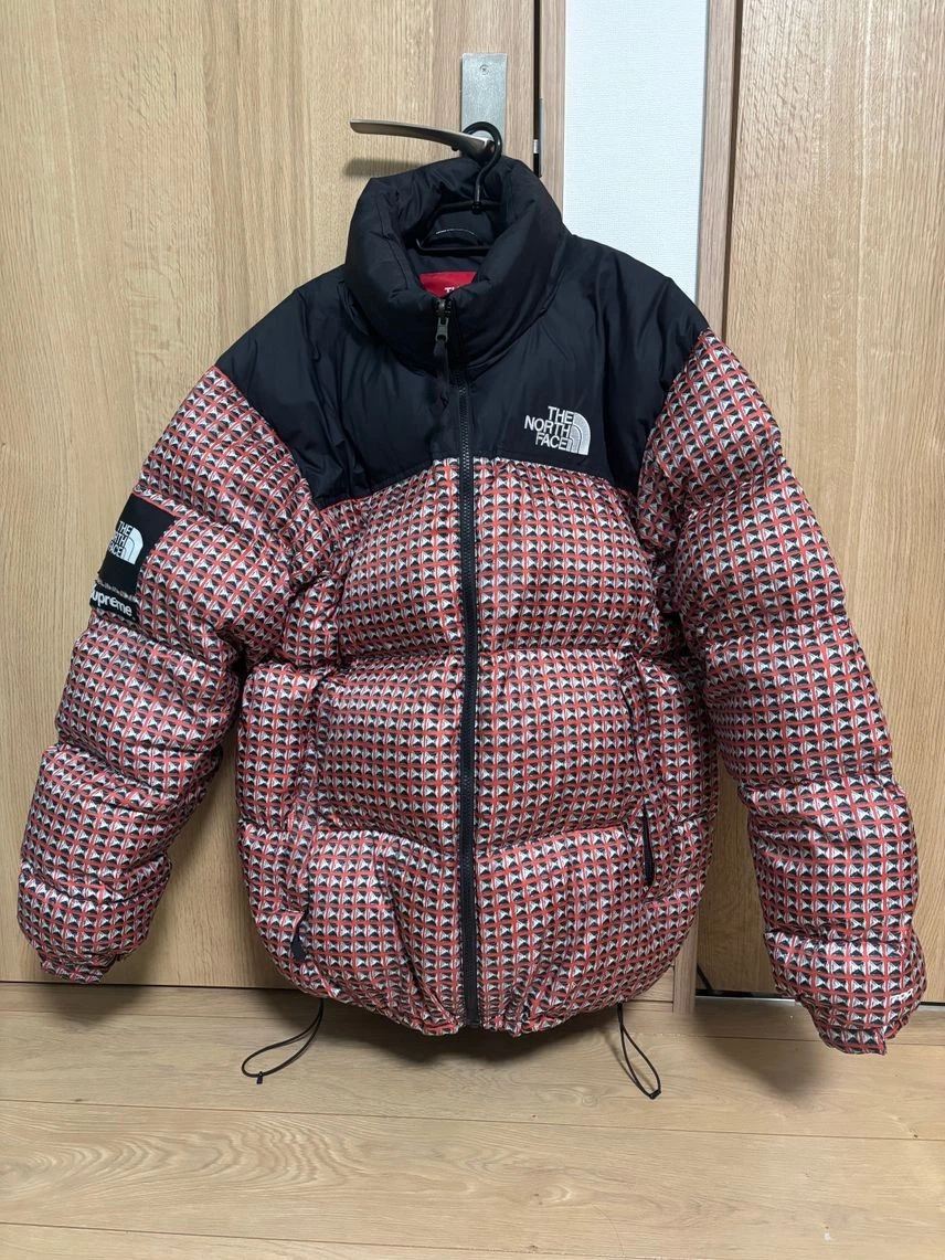 Veste Nuptse cloutée Supreme / The North Face rouge