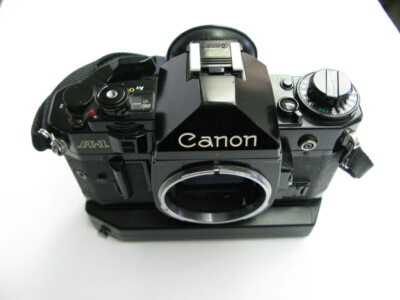 Canon A-1 film camera body with Genuine strap and Power Winder A2