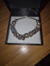 Chamilia Charm Bracelet with 12 Pretty Charms 