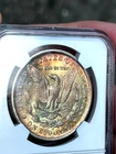 1884-O Morgan Dollar $1 MS 64 NGC Color Toned
