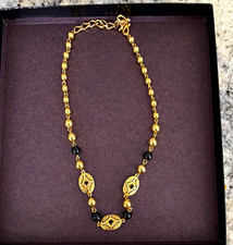Vintage Liz Claiborne necklace gold tone, black, signed