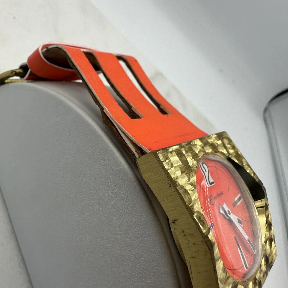 Reloj Mecánico Raro Endura Tono Dorado, Esfera Naranja Brillante y Correa 40mm, Funciona Foto 3 de 4