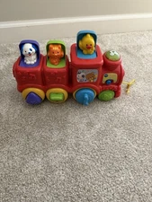 VTech Roll & Surprise Animal Train Music & Lights Pop-Up Activity Preschool Toy