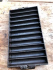 Cast iron Wagner Ware Bread stick pan with star marking and slag
