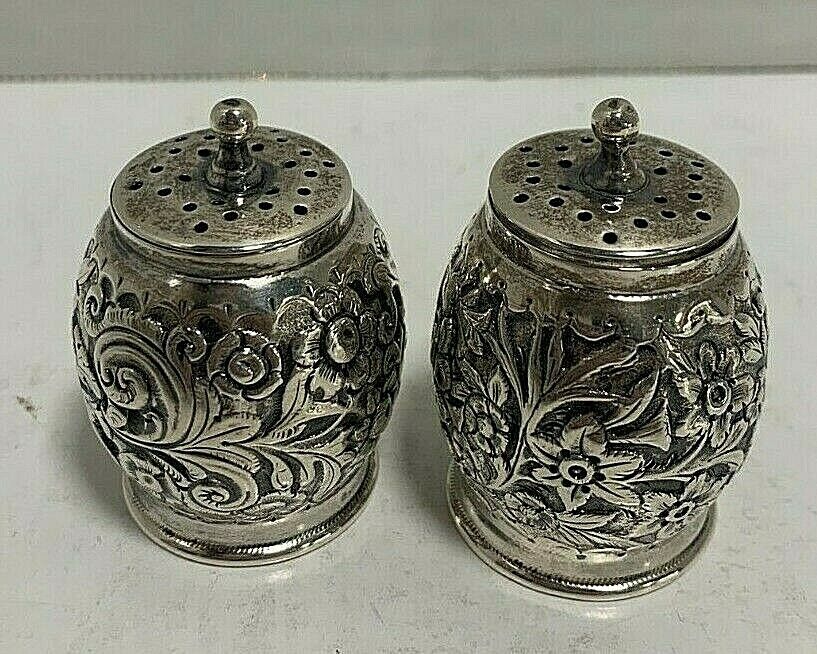 E S BARNSLEY  Co STERLING SILVER REPOUSSE SALT AND PEPPER SHAKE