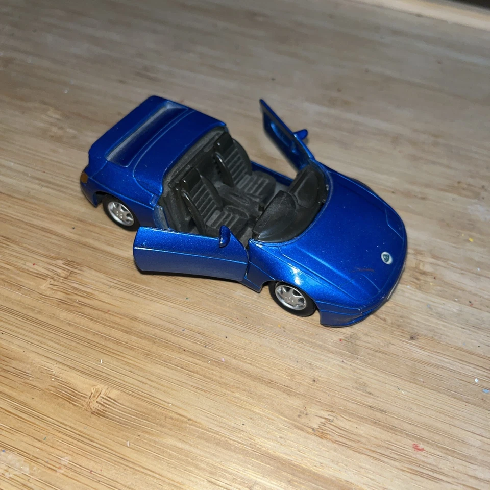 Coche fundido a presión azul MC Maisto Lotus Elan 1:36 #110 usado Foto 4 de 4