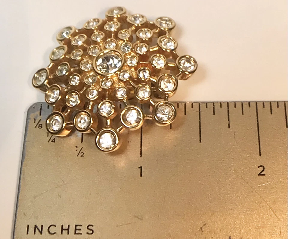SWAROVSKI VINTAGE CLEAR CRYSTAL GOLDTONE FLOWER STARBURST CLIP EARRINGS (S123.5) - Image 4 of 4