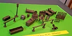 LARGE LOT OF VINTAGE MARX WESTERN TOWN FURNITURE WITH A GOOD BARBER'S CHAIR.....
