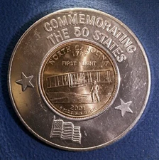 Encased North Carolina state quarter dated 2001 - Commemorating the 50 States