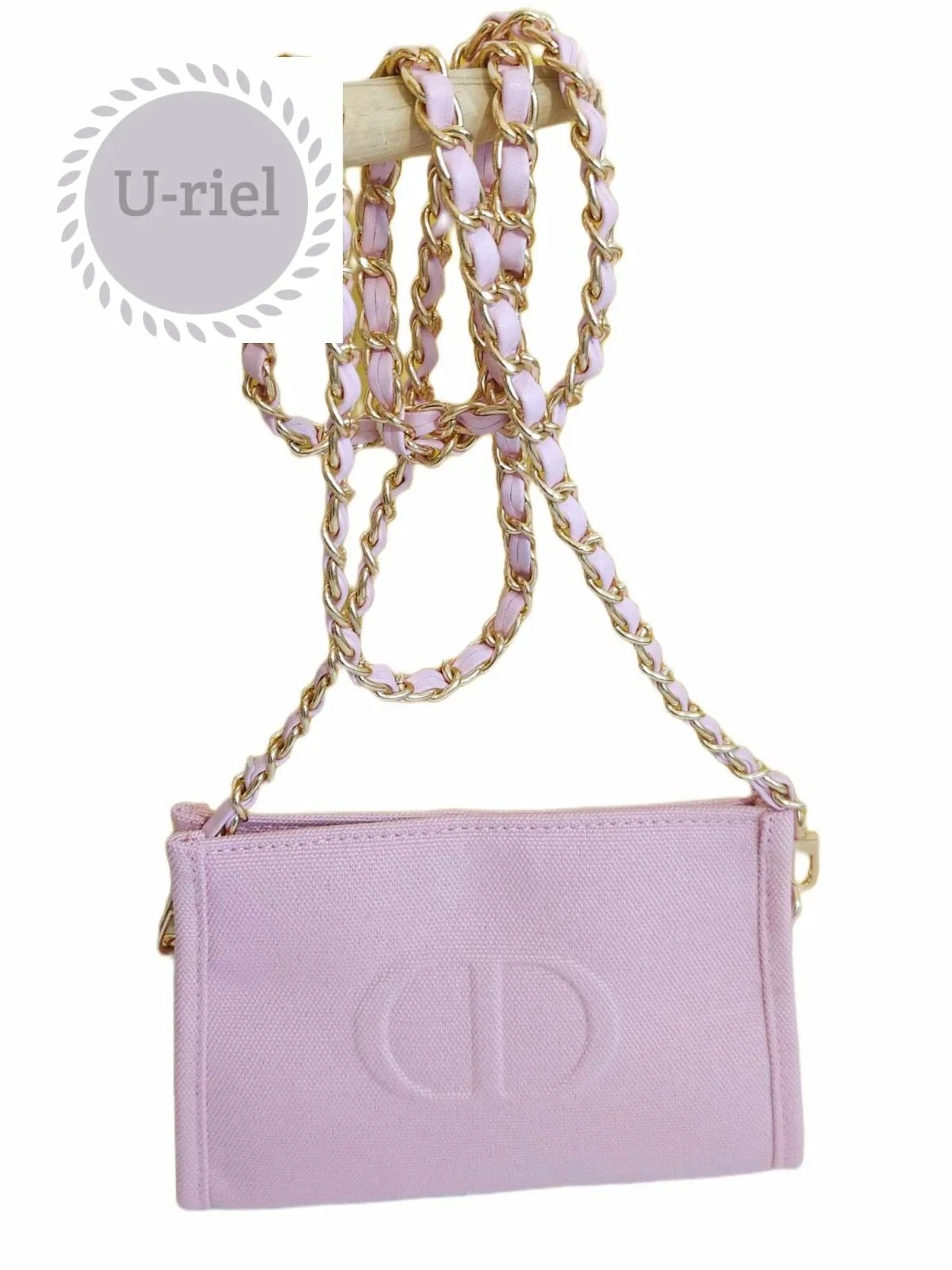 Sac pochette à maquillage rose Dior caché pour sac