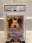 PSA 8 Alakazam 1/130 Holo Rare Base Set 2 Pokemon Card WOTC 2000 Vintage Swirl