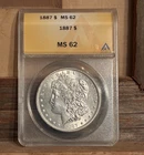 1887 Morgan Silver $1 Dollar  0.9 Fine - Graded ANACS MS62